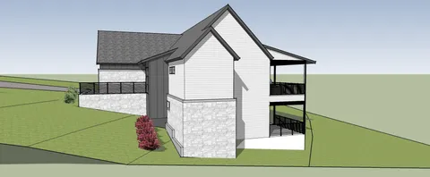 a view of a dirt road with a building in the background