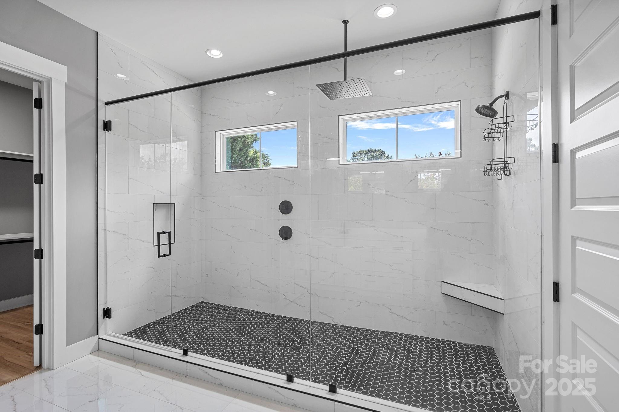 20615 Rio Oro Drive Cornelius, NC 28031 - Photo 20 of 40 a bathroom with a shower and a sink