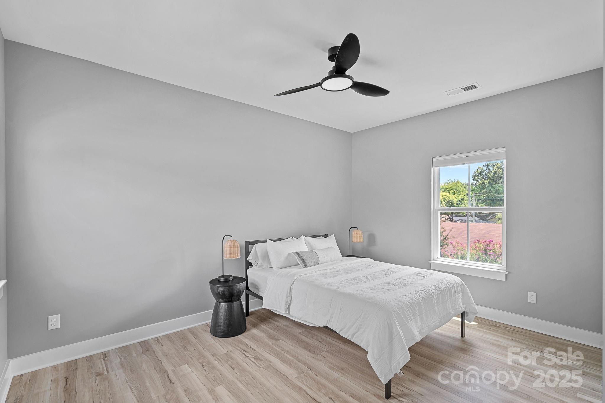 20615 Rio Oro Drive Cornelius, NC 28031 - Photo 25 of 40 a bedroom with a bed and a window