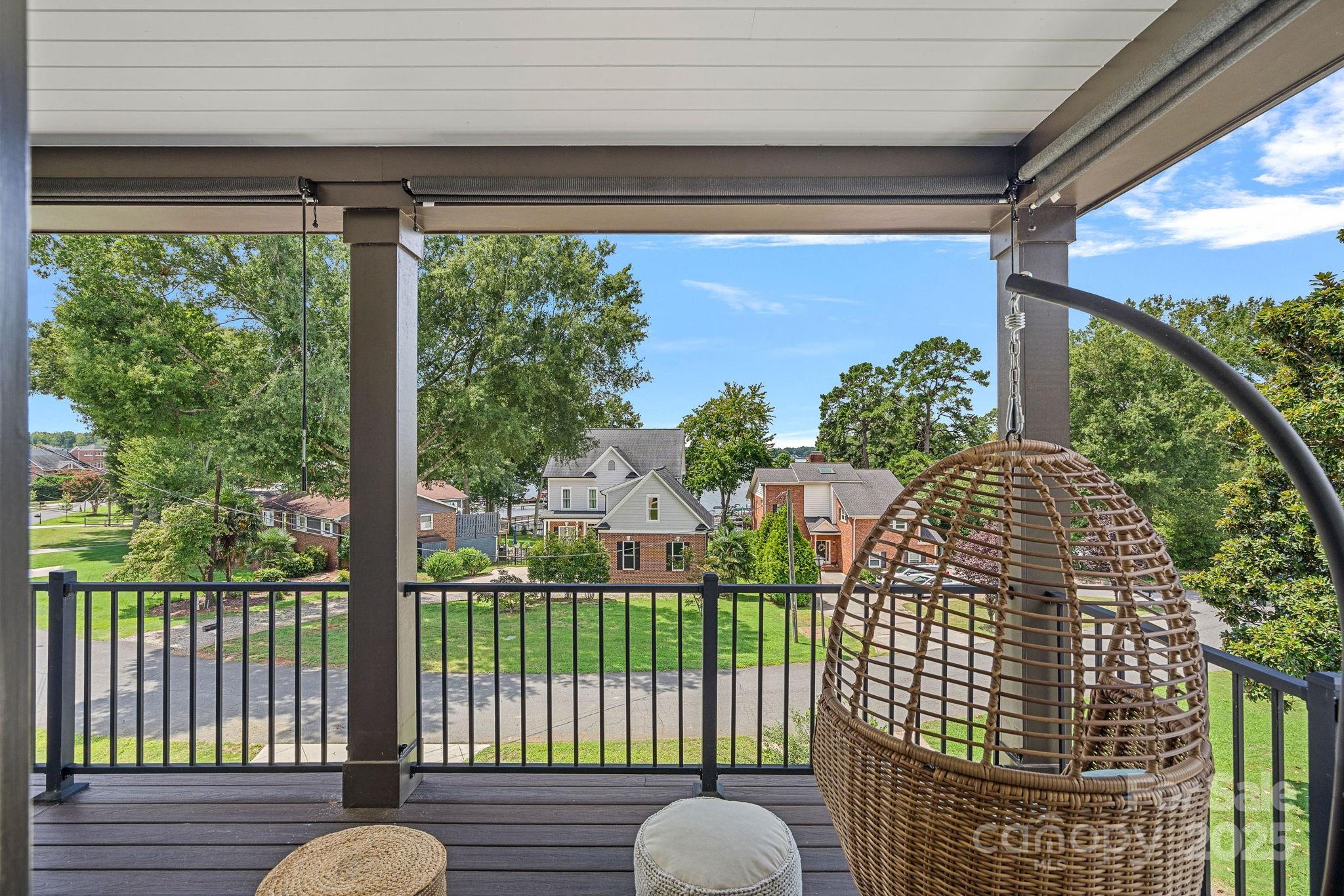 20615 Rio Oro Drive Cornelius, NC 28031 - Photo 26 of 40 a balcony view with a garden