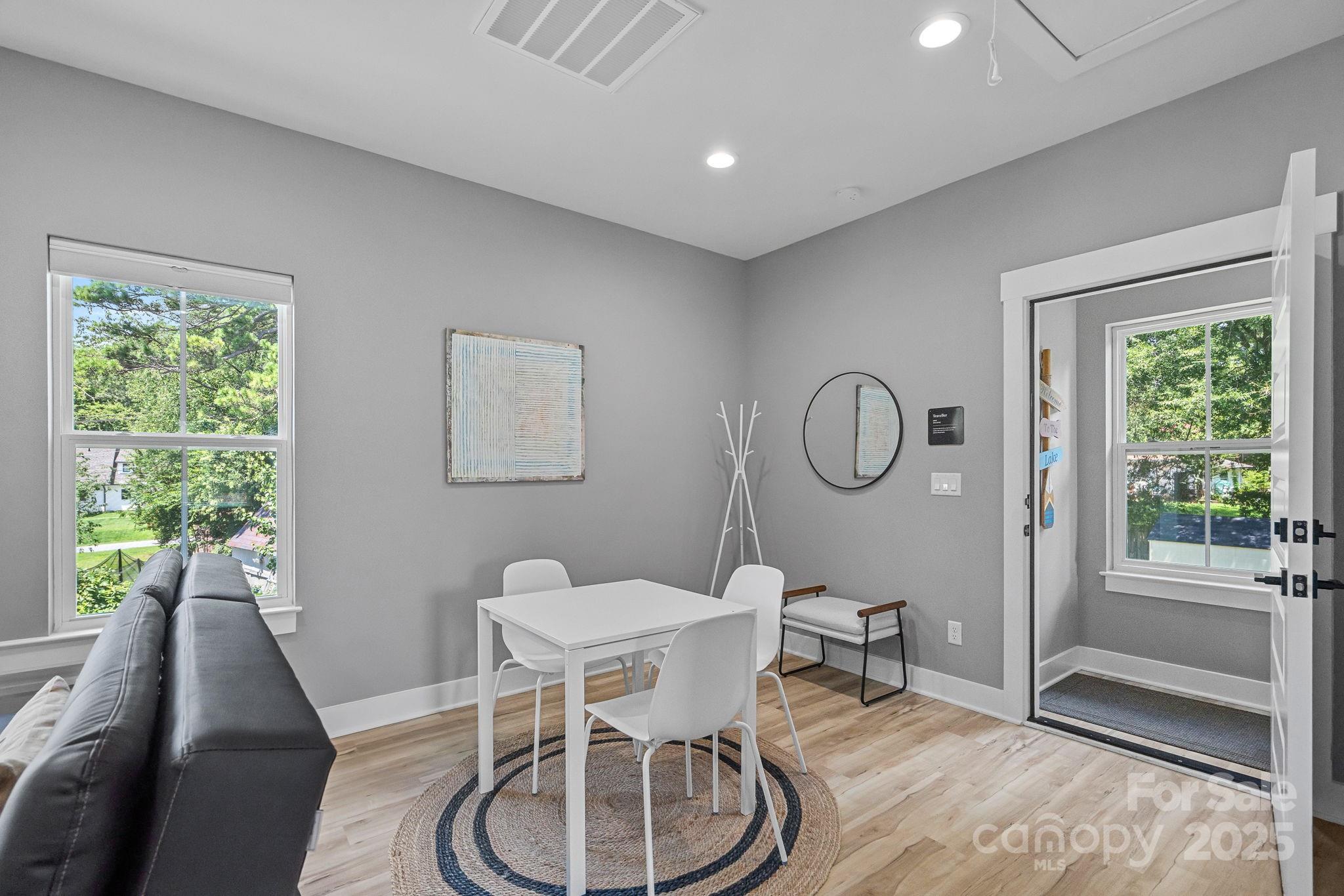 20615 Rio Oro Drive Cornelius, NC 28031 - Photo 29 of 40 a bathroom with a toilet a sink and a window