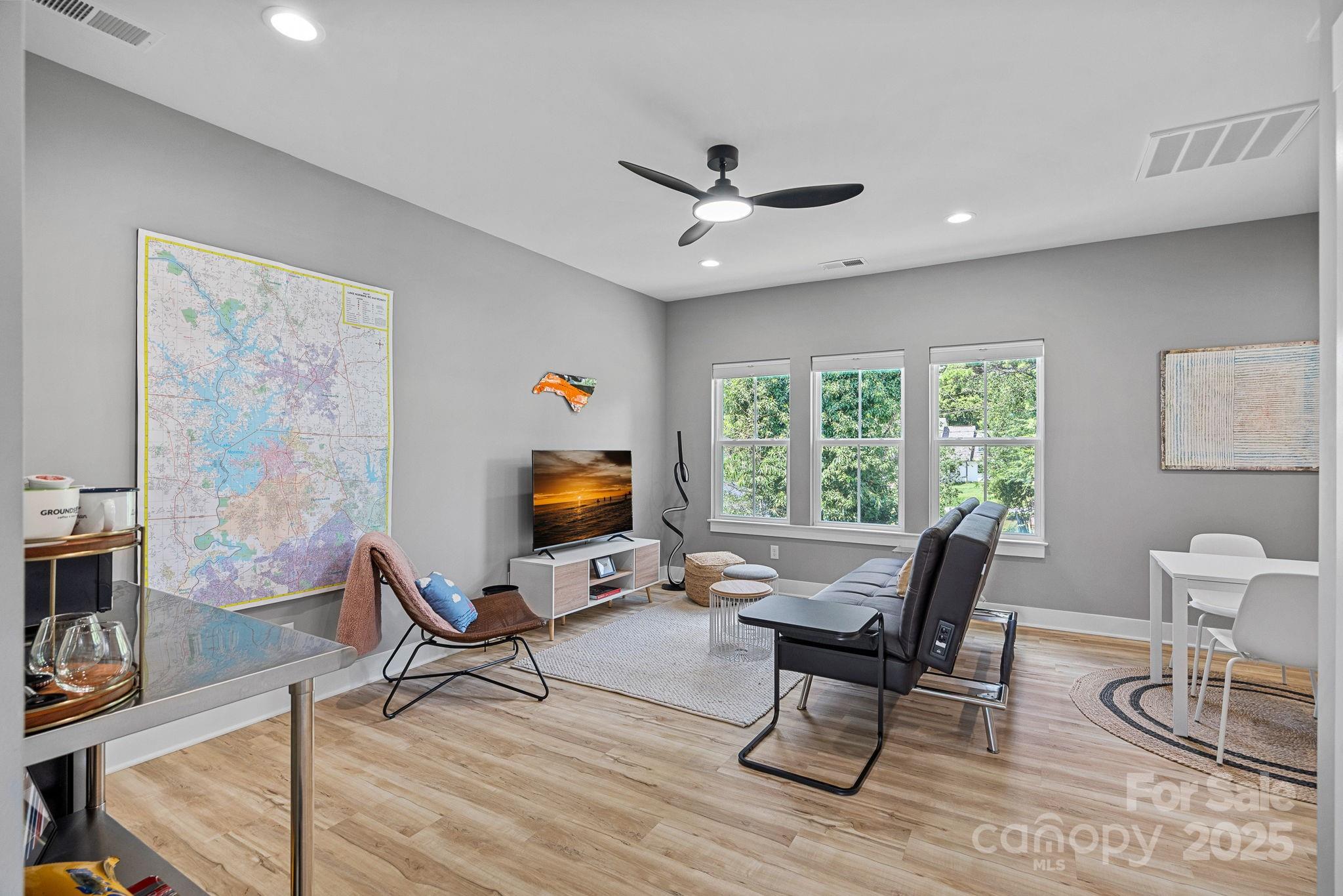 20615 Rio Oro Drive Cornelius, NC 28031 - Photo 32 of 40 a workspace with wooden floor and a window