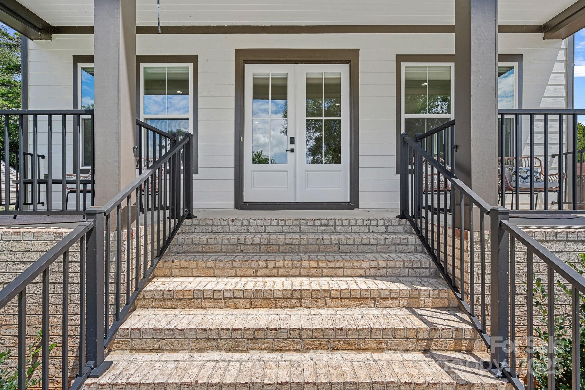 20615 Rio Oro Drive Cornelius, NC 28031 - Photo 6 of 40 a view of entryway with brick walls