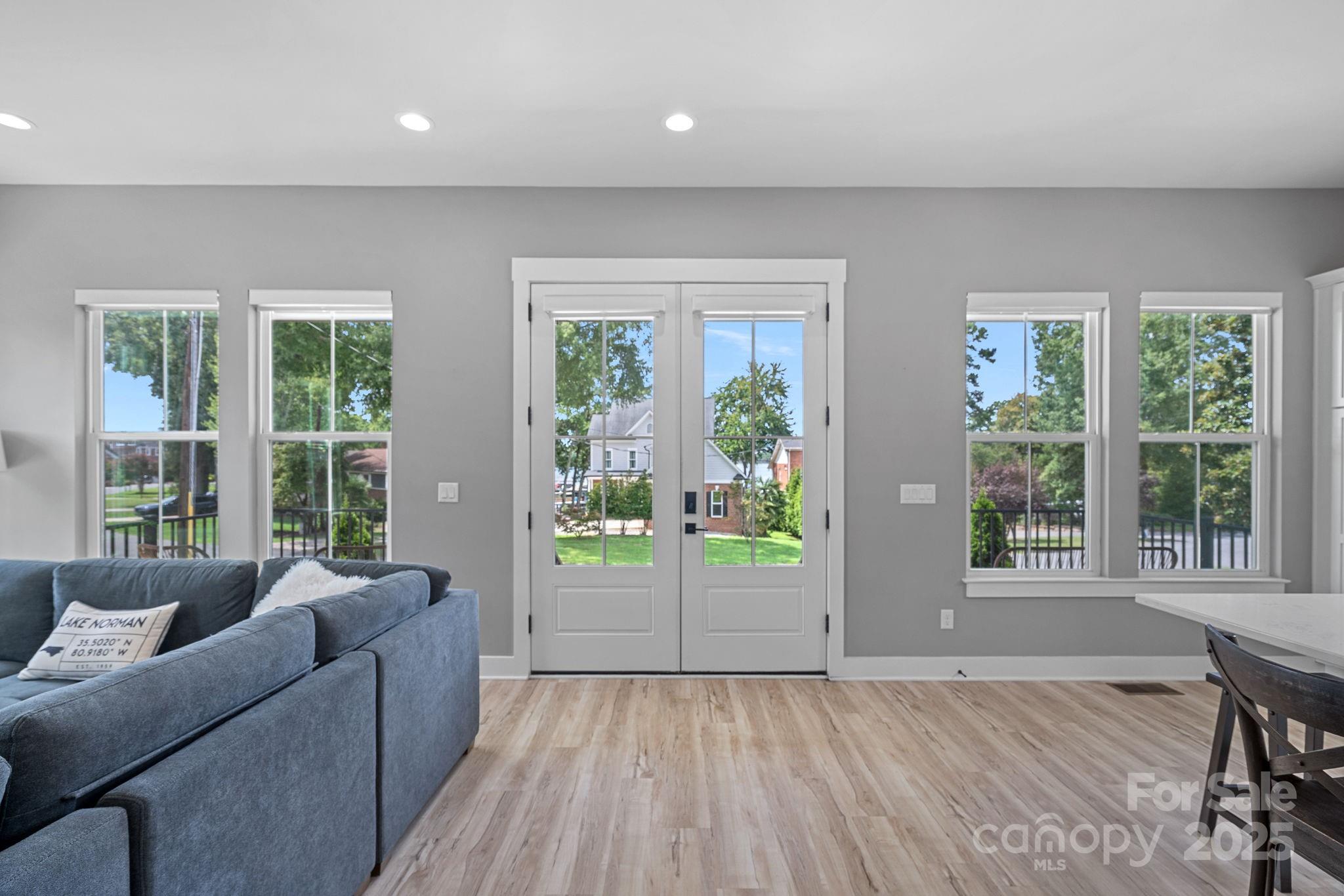 20615 Rio Oro Drive Cornelius, NC 28031 - Photo 7 of 40 a living room with furniture and a window