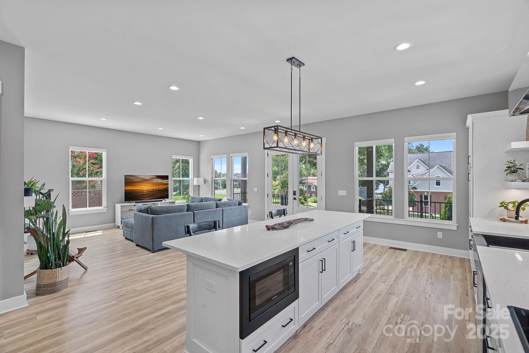 20615 Rio Oro Drive Cornelius, NC 28031 - Photo 10 of 40 a view of living room with furniture and flat screen tv