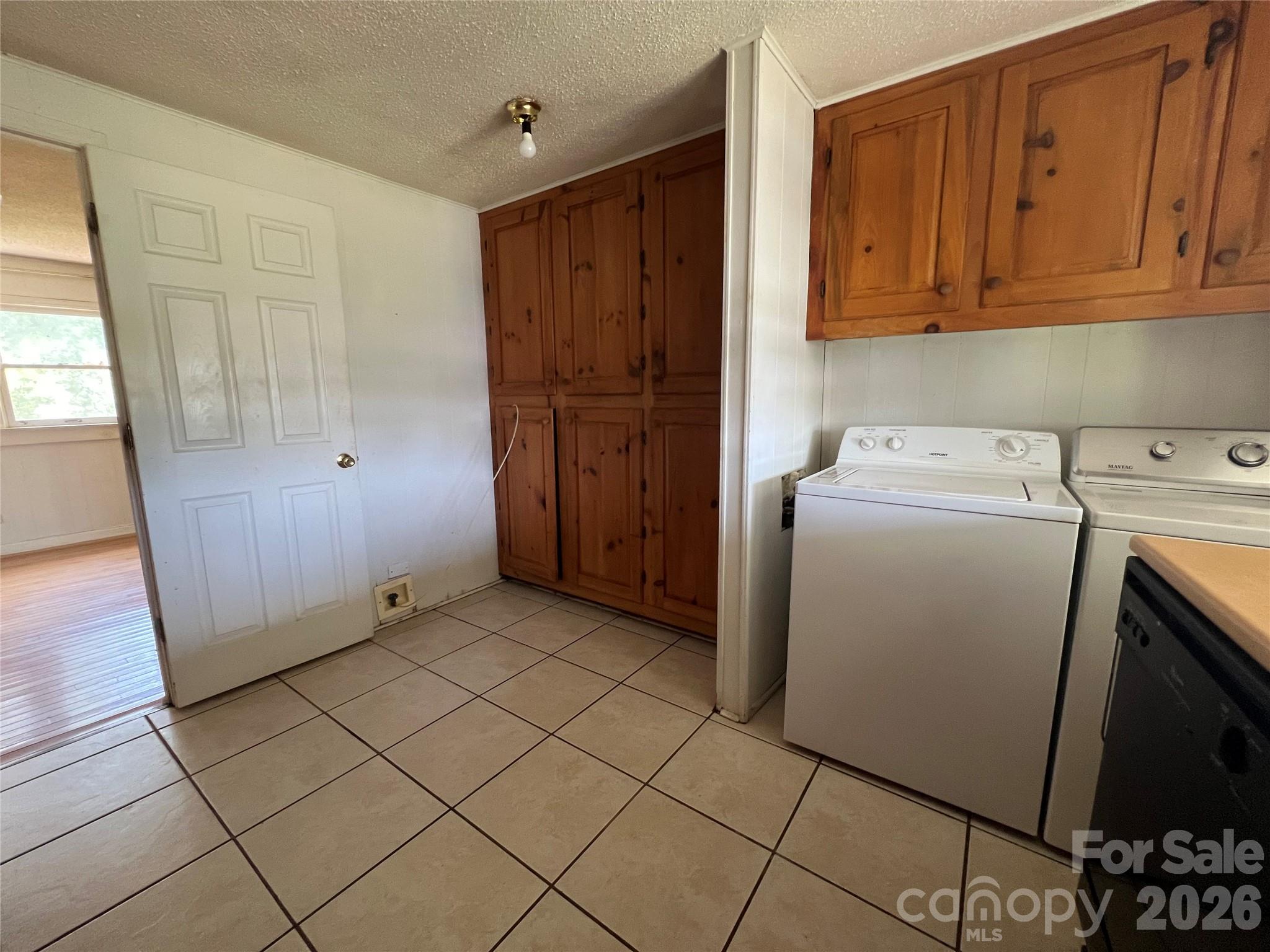 4405 Maple Creek Road Rutherfordton, NC 28139 - Photo 12 of 32 a view of a storage & utility room with dryer and washer