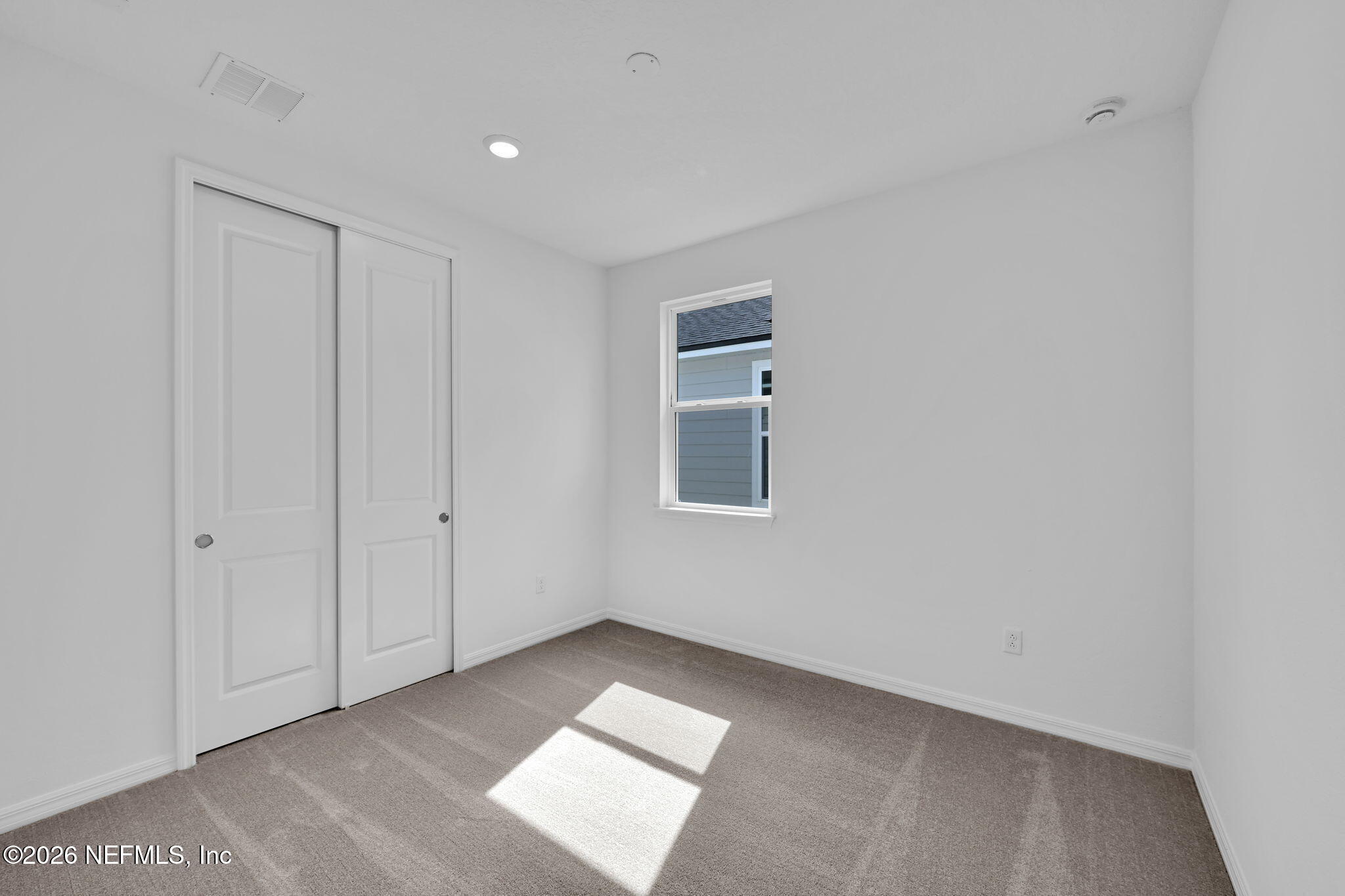 525 Peppervine Way Yulee, FL 32097 - Photo 26 of 29 Highgate Secondary Bedroom