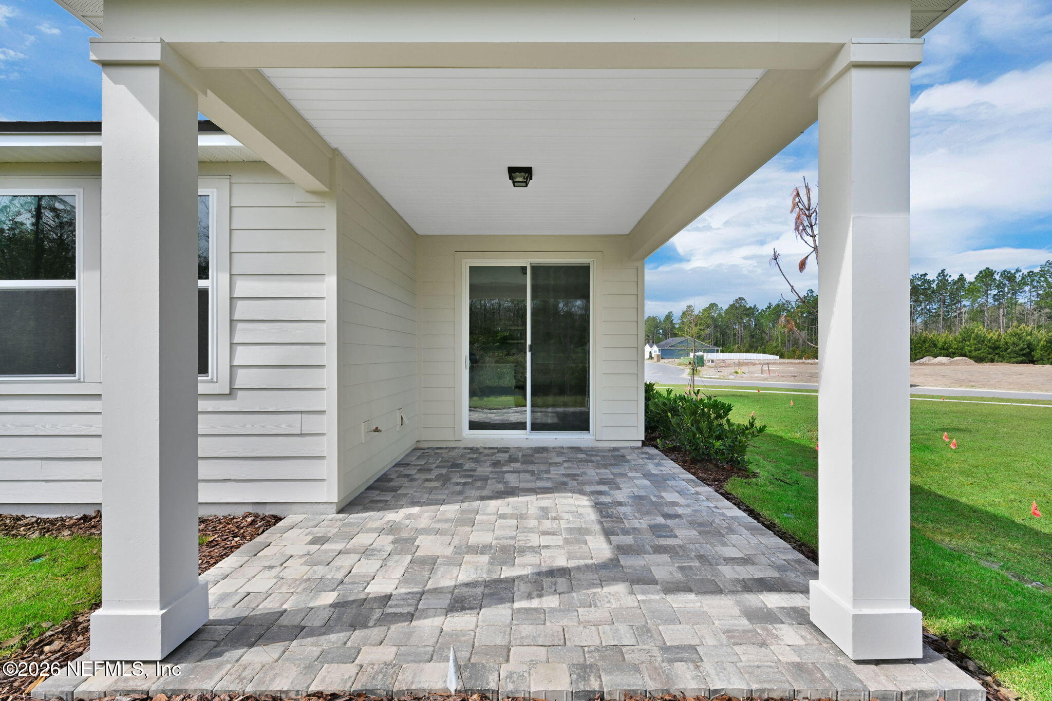 525 Peppervine Way Yulee, FL 32097 - Photo 27 of 29 Highgate Covered Lanai
