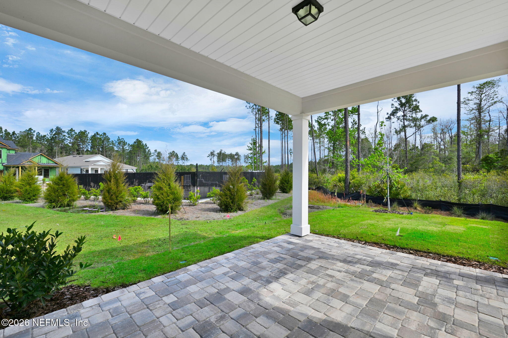 525 Peppervine Way Yulee, FL 32097 - Photo 28 of 29 Highgate Covered Lanai