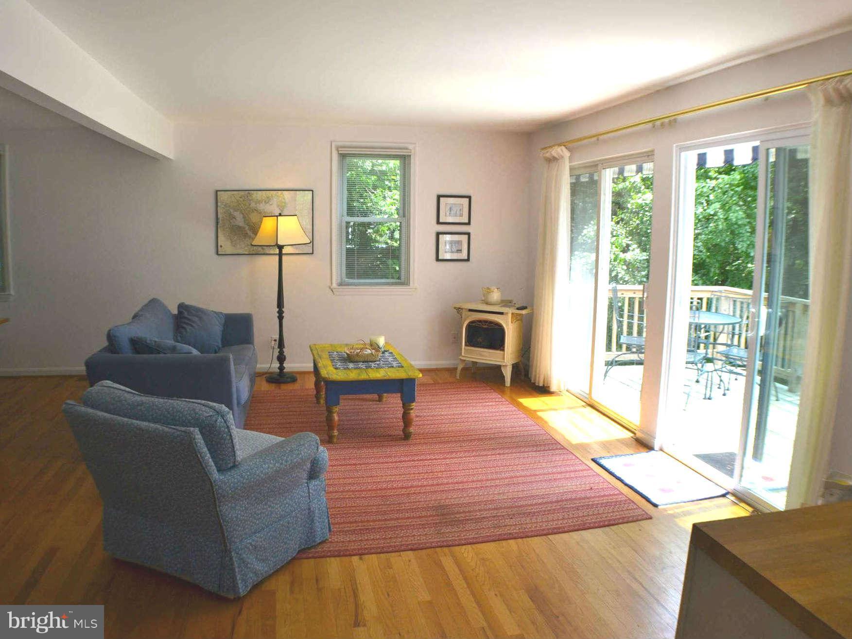 392 Riverside Drive Pasadena, MD 21122 - Photo 17 of 30 a living room with furniture and a window