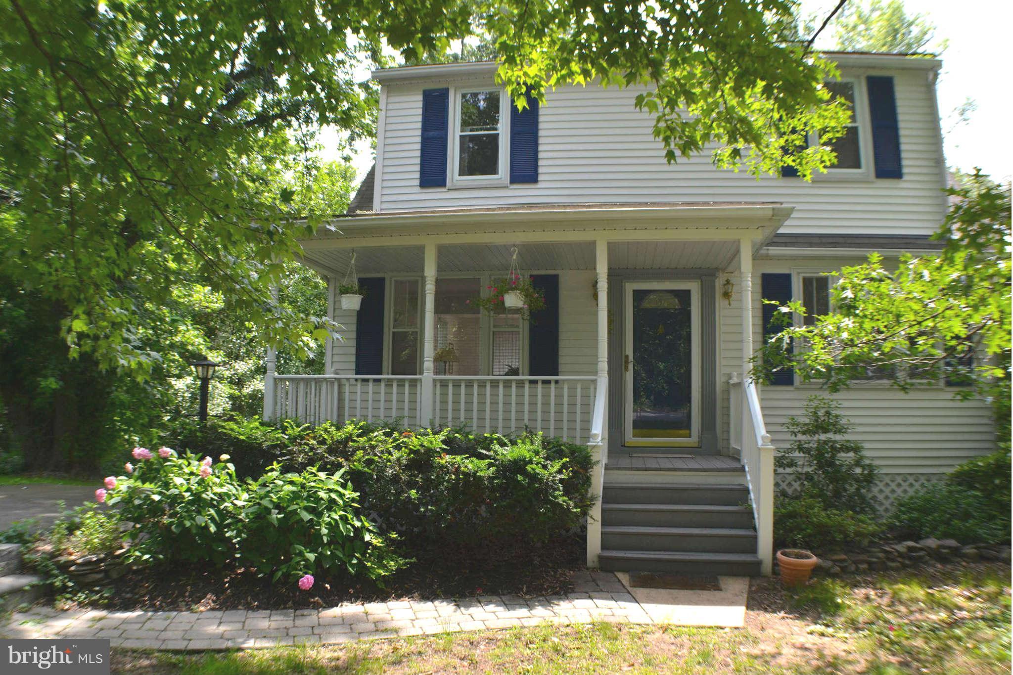392 Riverside Drive Pasadena, MD 21122 - Photo 3 of 30 a view of a house with potted plants