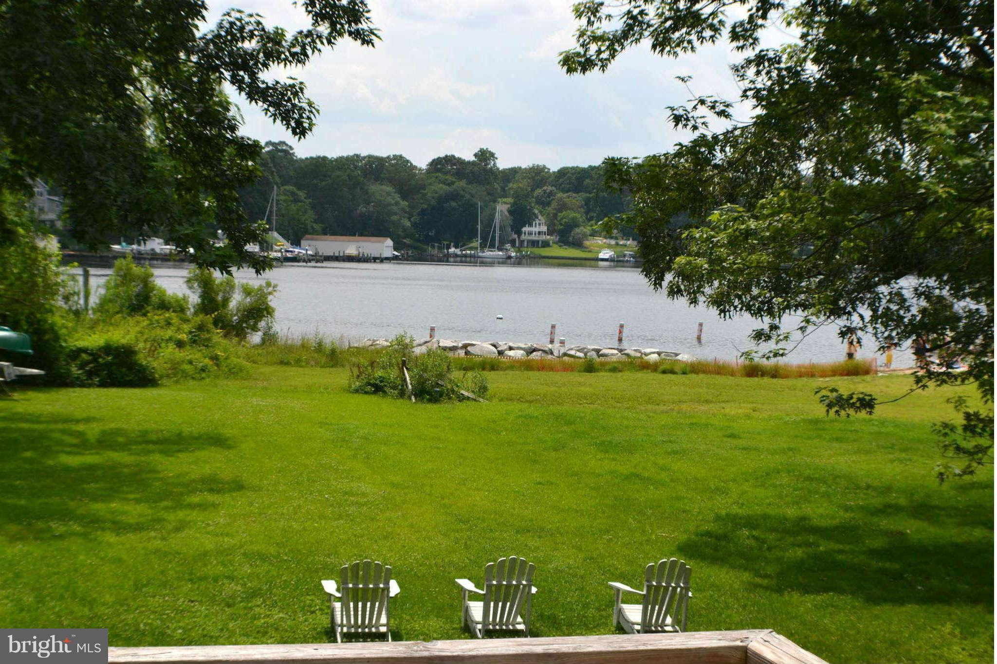 392 Riverside Drive Pasadena, MD 21122 - Photo 22 of 30 a view of yard with swimming pool and green space