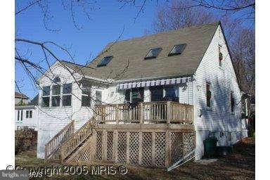 392 Riverside Drive Pasadena, MD 21122 - Photo 24 of 30 a view of roof deck with wooden floor and fence