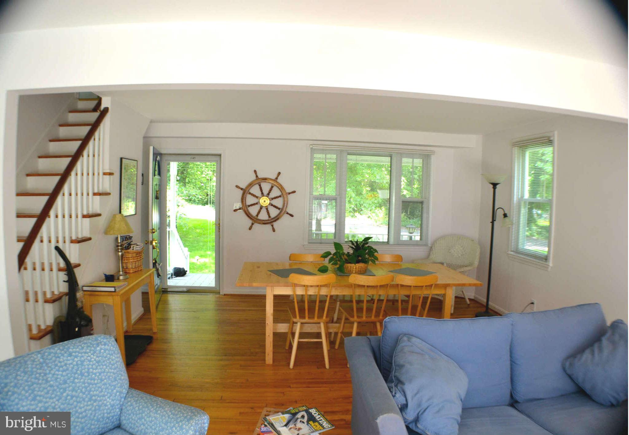 392 Riverside Drive Pasadena, MD 21122 - Photo 27 of 30 a living room with furniture and wooden floor