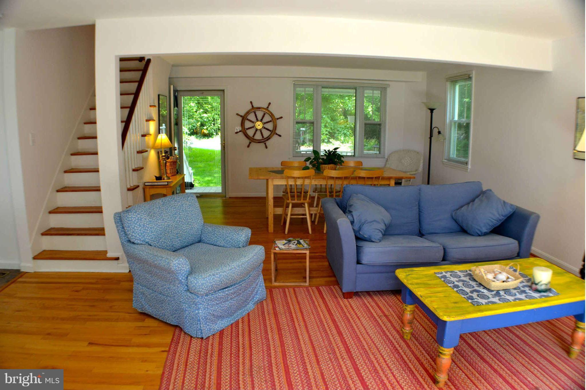 392 Riverside Drive Pasadena, MD 21122 - Photo 5 of 30 a living room with furniture and a wooden floor
