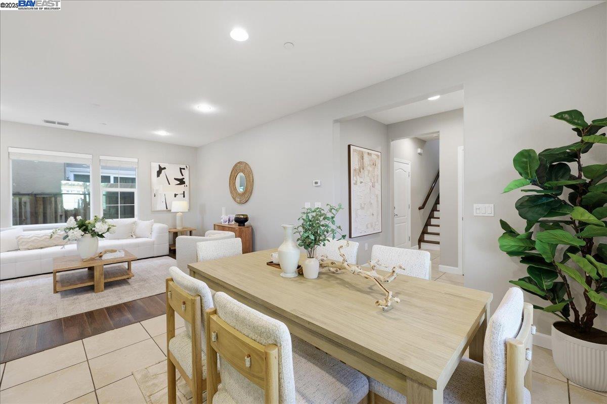 1504 Middle Lane Hayward, CA 94545 - Photo 12 of 60 a living room with furniture potted plant and a wooden floor