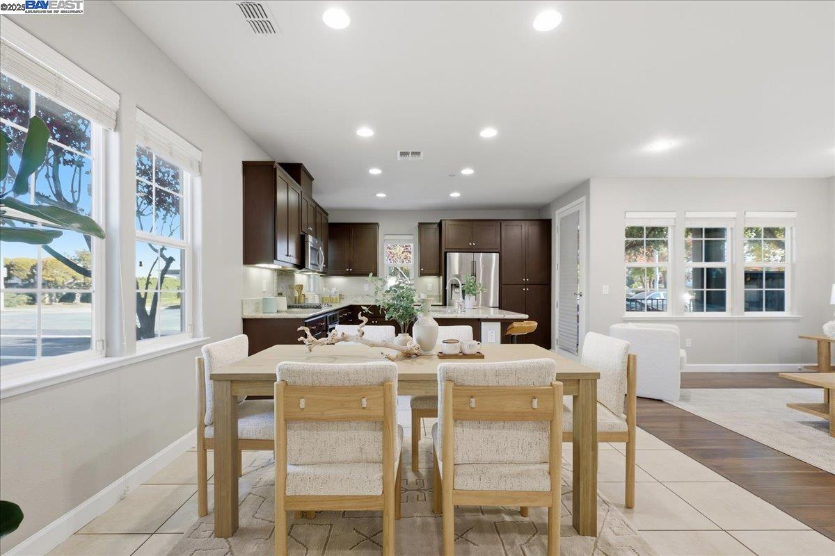 1504 Middle Lane Hayward, CA 94545 - Photo 14 of 60 a view of a dining room with furniture and a large window