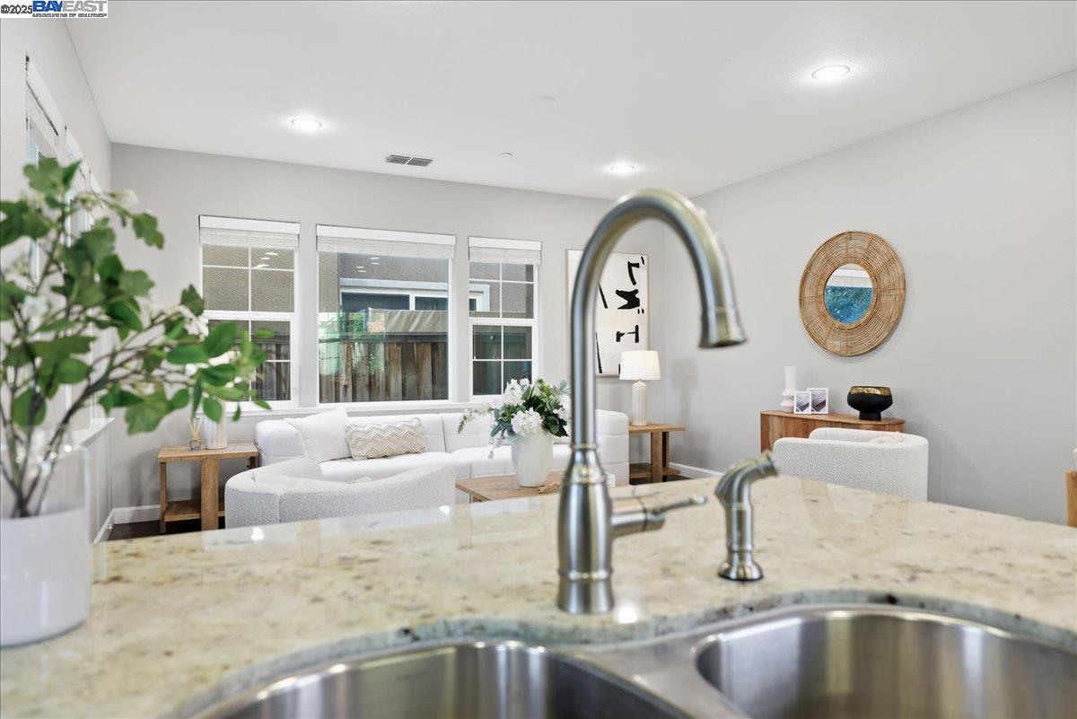 1504 Middle Lane Hayward, CA 94545 - Photo 24 of 60 a living room with furniture and a large window