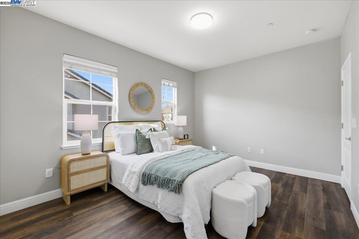 1504 Middle Lane Hayward, CA 94545 - Photo 32 of 60 a bedroom with a bed and a large window