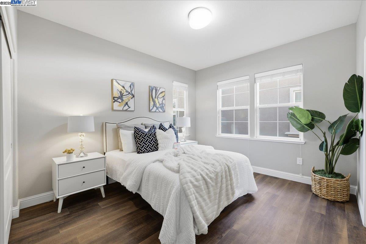 1504 Middle Lane Hayward, CA 94545 - Photo 37 of 60 a bedroom with a bed and a potted plant