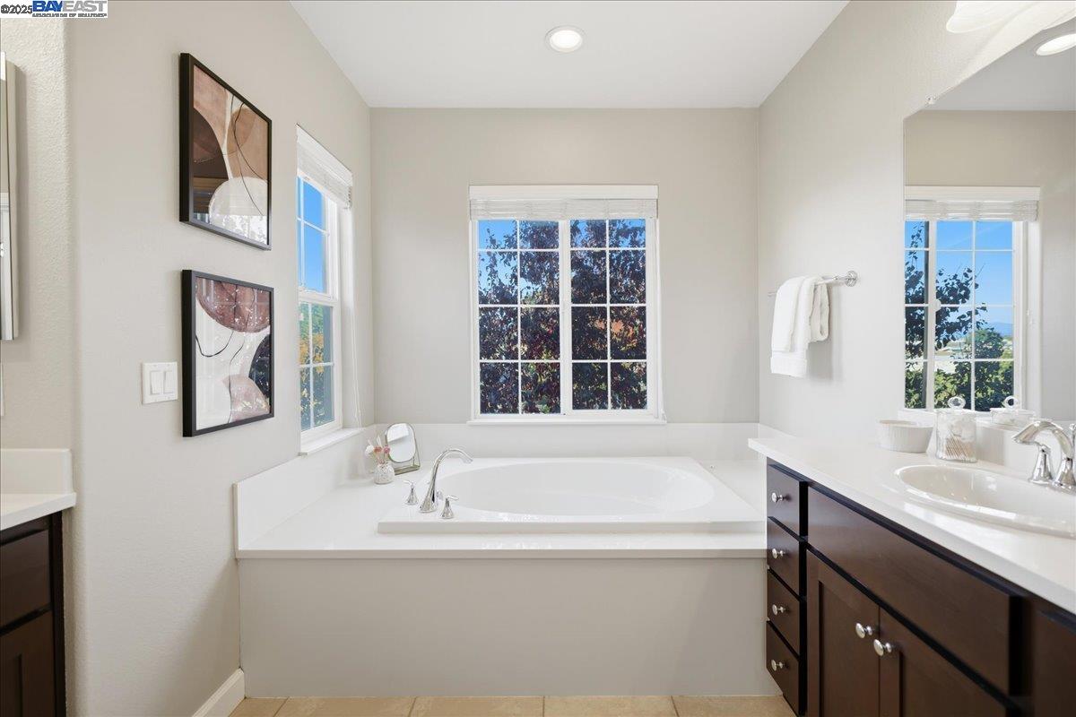 1504 Middle Lane Hayward, CA 94545 - Photo 52 of 60 a bathroom with a bathtub and a sink