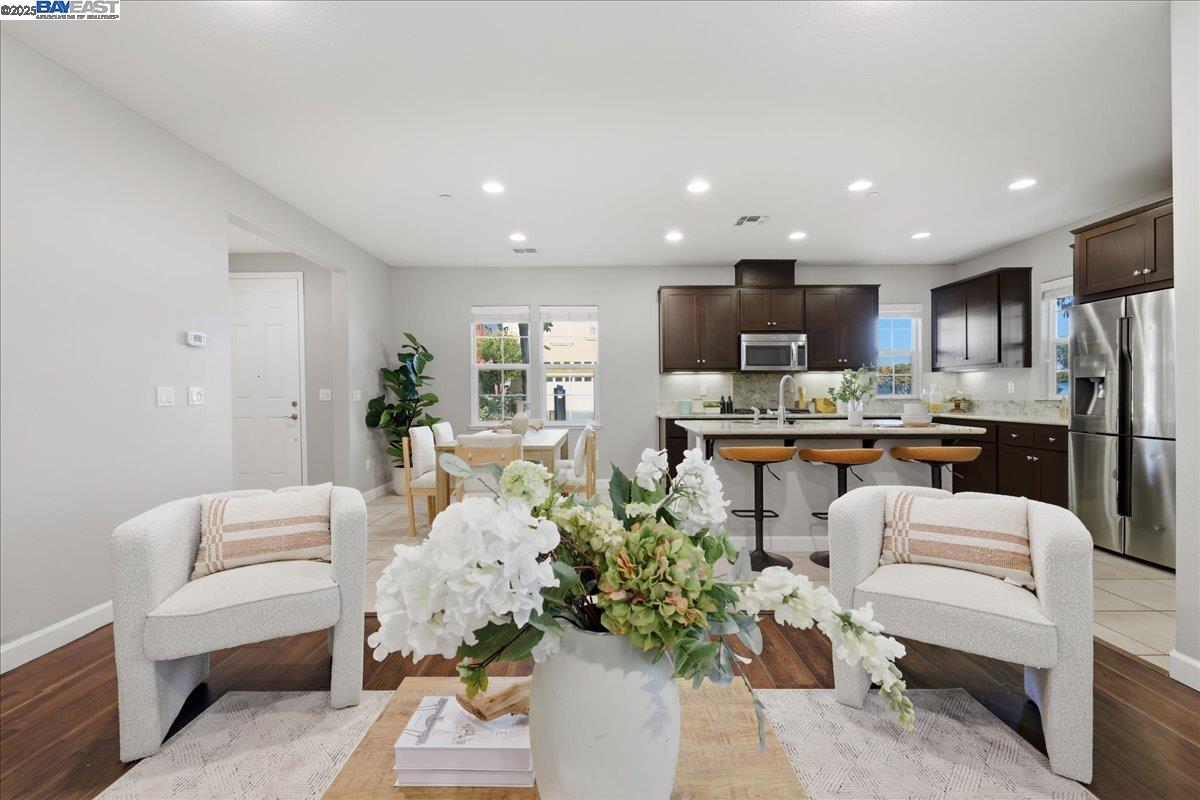 1504 Middle Lane Hayward, CA 94545 - Photo 8 of 60 a living room with stainless steel appliances furniture and a view of kitchen