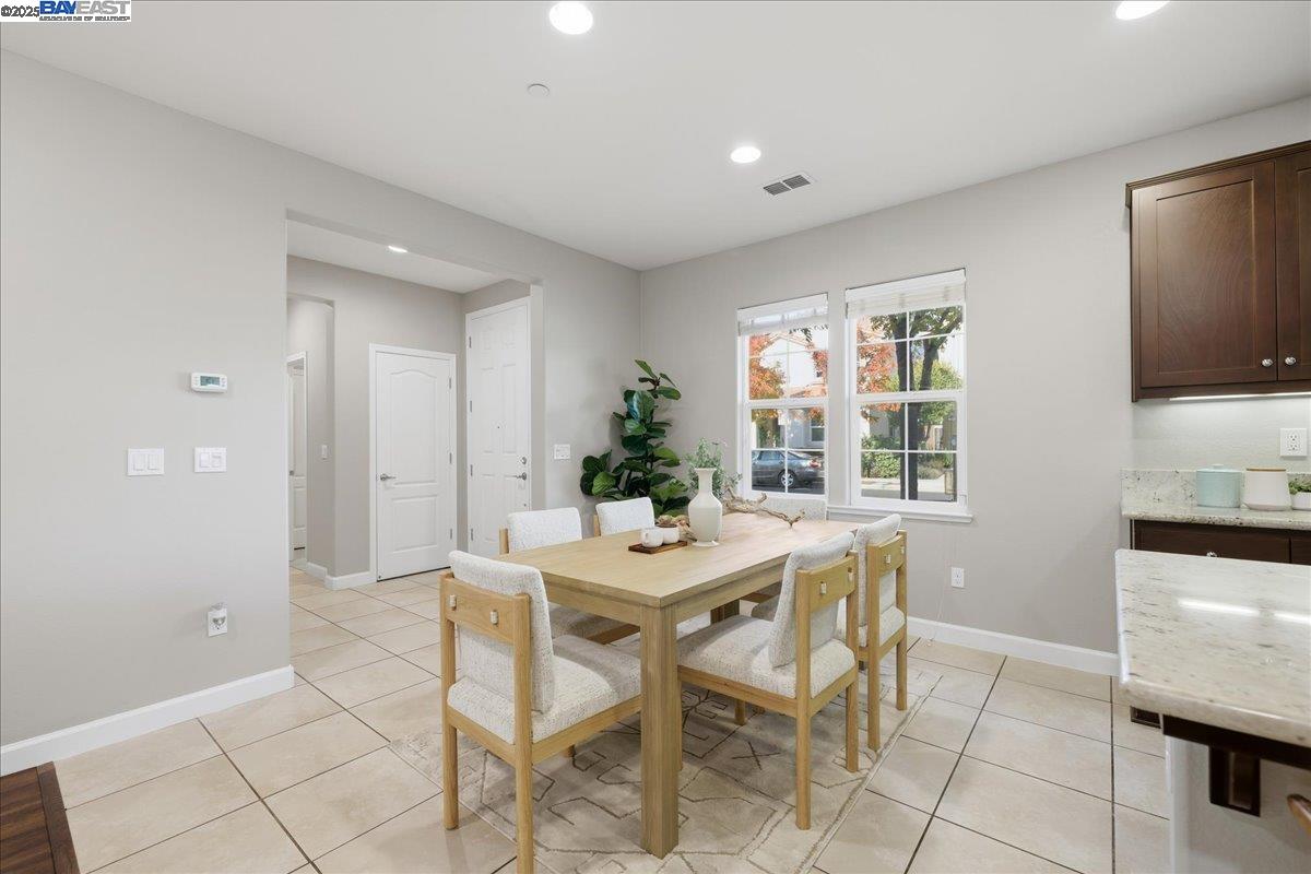 1504 Middle Lane Hayward, CA 94545 - Photo 10 of 60 a dining room with furniture and window