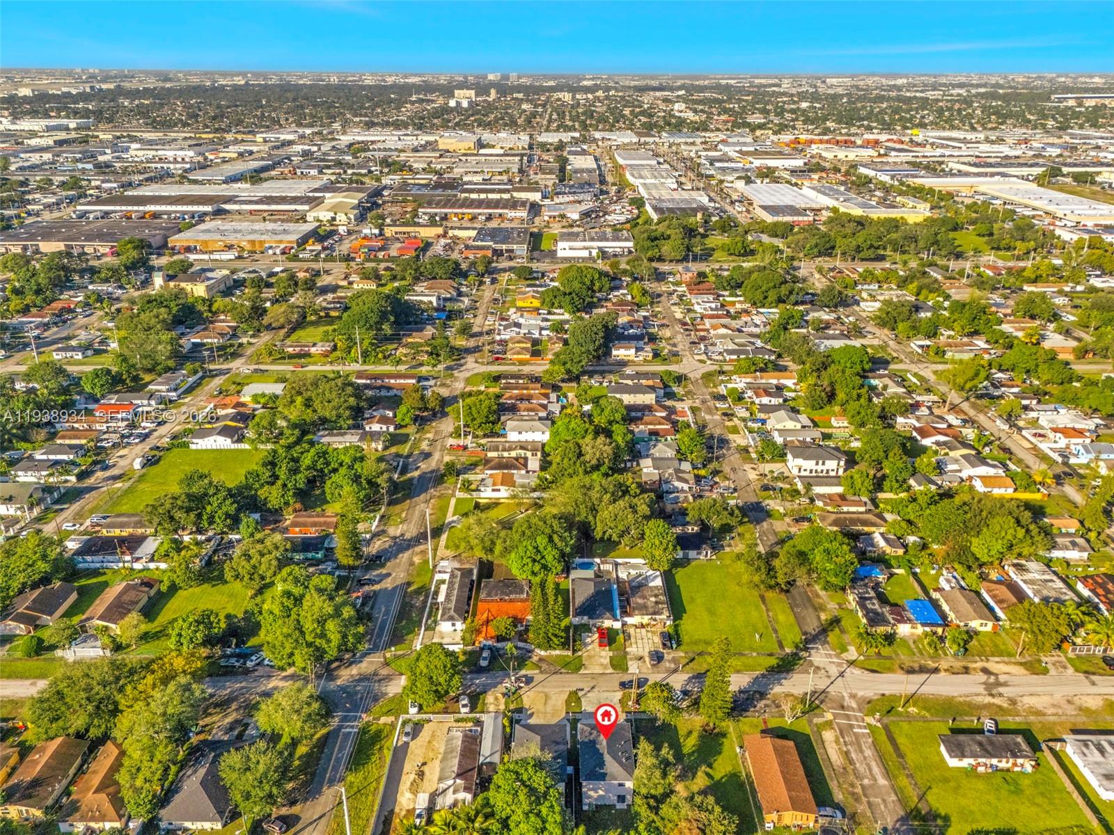 5821 Northwest 30th Avenue Miami, FL 33142 - Photo 13 of 14 an aerial view of residential building with parking space