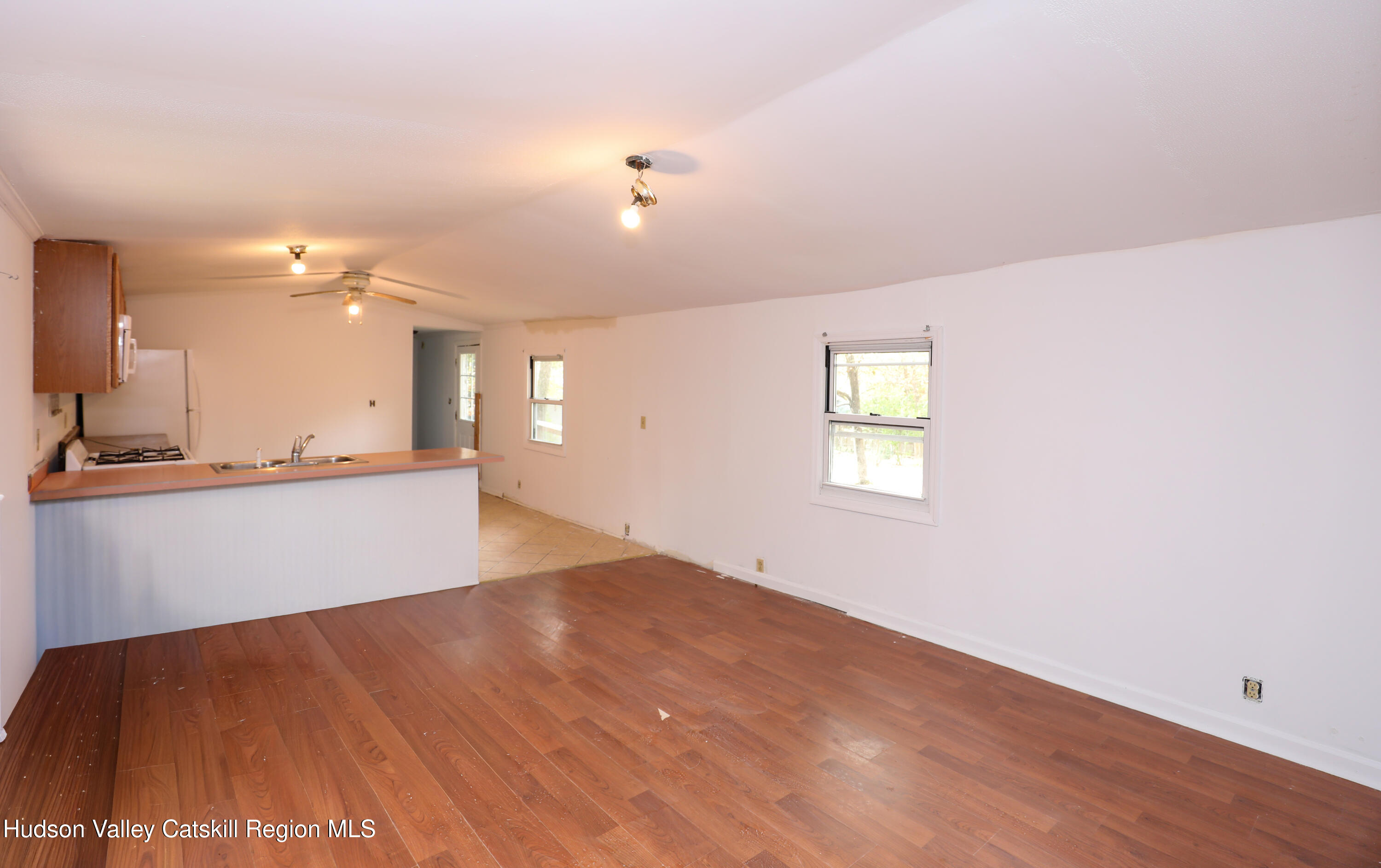 130 Timberwall Road, Unit 24 Saugerties, NY 12477 - Photo 12 of 20 a view of an empty room and kitchen view
