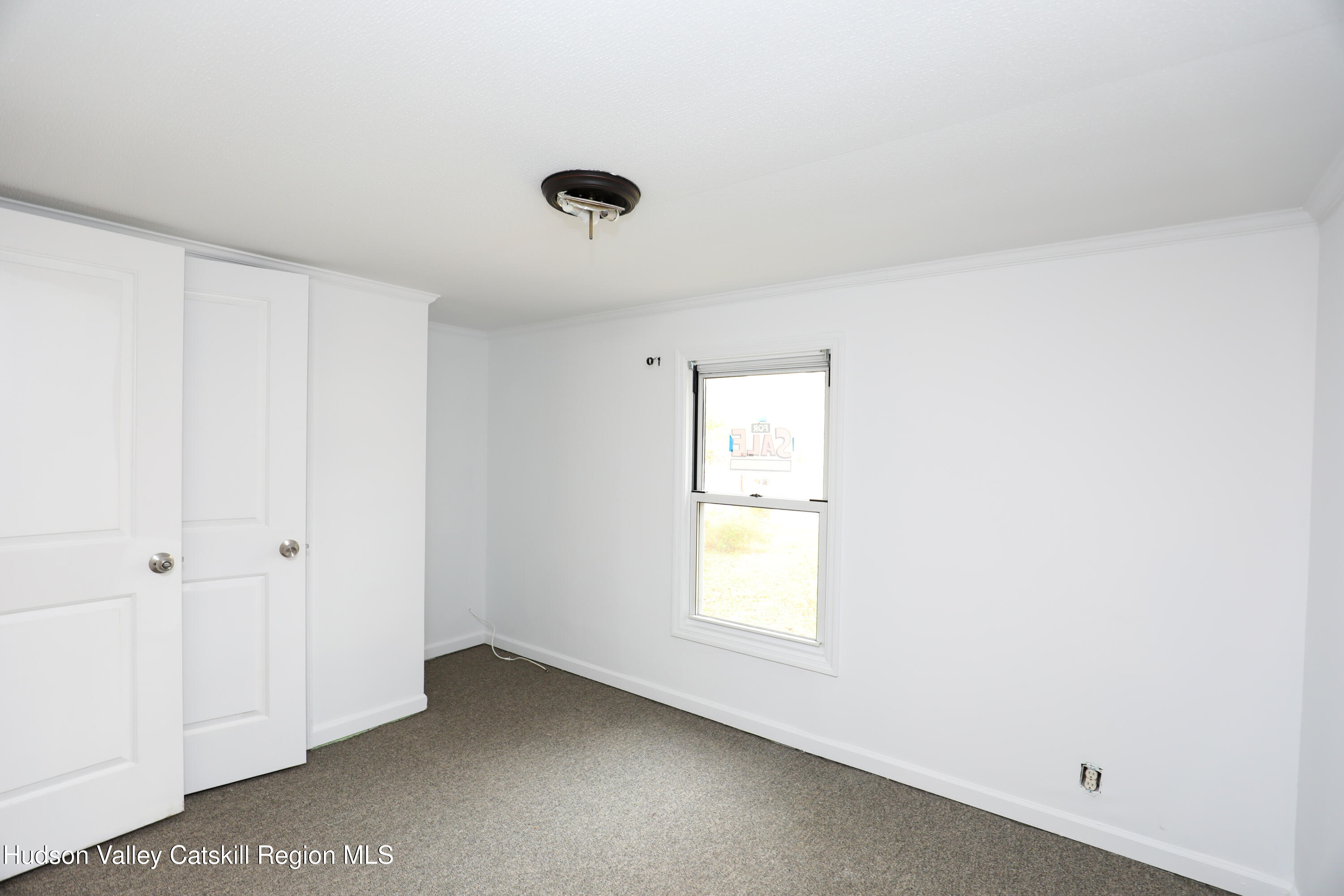130 Timberwall Road, Unit 24 Saugerties, NY 12477 - Photo 14 of 20 an empty room with windows