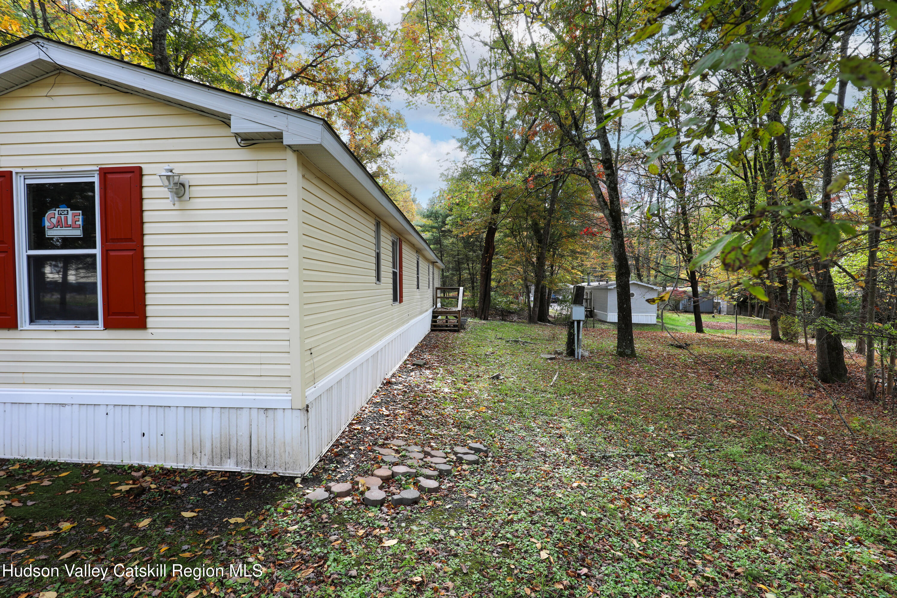 130 Timberwall Road, Unit 24 Saugerties, NY 12477 - Photo 20 of 20 a view of house with backyard and trees