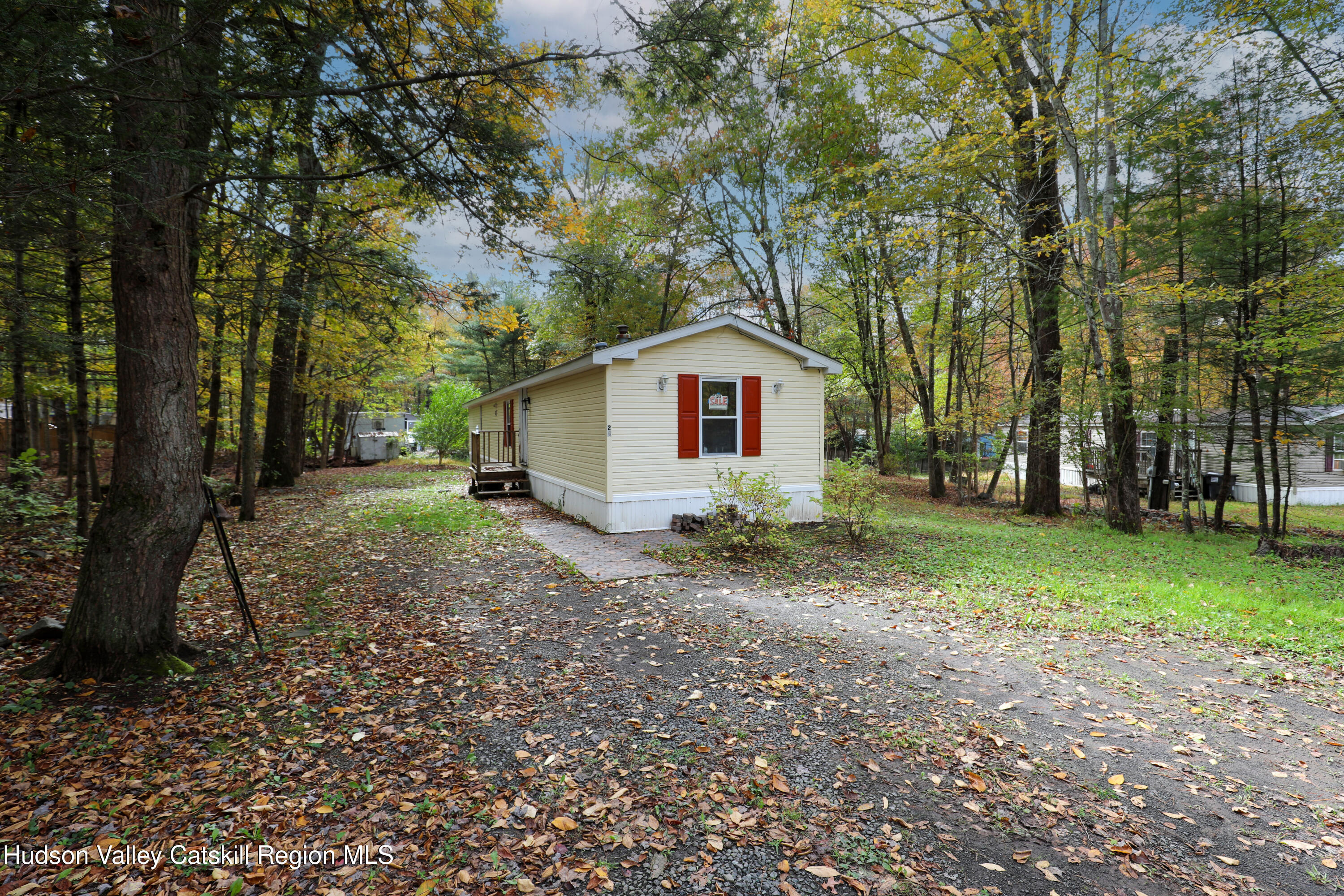 130 Timberwall Road, Unit 24 Saugerties, NY 12477 - Photo 2 of 20 a view of front of a house with a yard