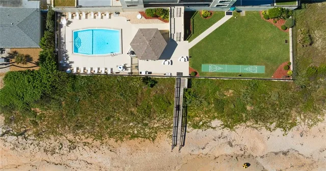 a view of a swimming pool with an ocean view
