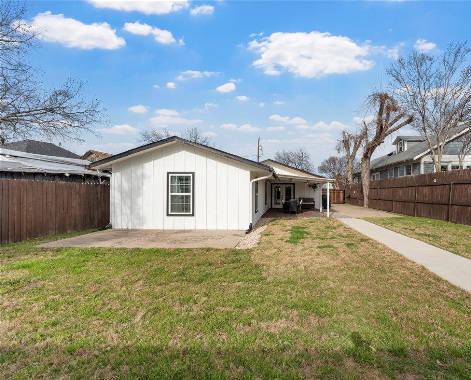 621 South 9th Street Waco, TX 76706 - Photo 28 of 31 a view of a house with backyard and a tree