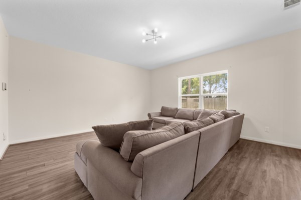 1327 Diamond Drape Drive Rosharon, TX 77583 - Photo 5 of 26 a living room with furniture and a large window