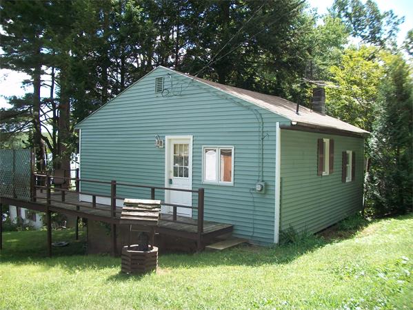 61 Spring Street Lunenburg, MA 01462 - Photo 1 of 1 a backyard of a house