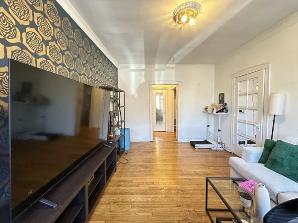 a lobby with furniture and window