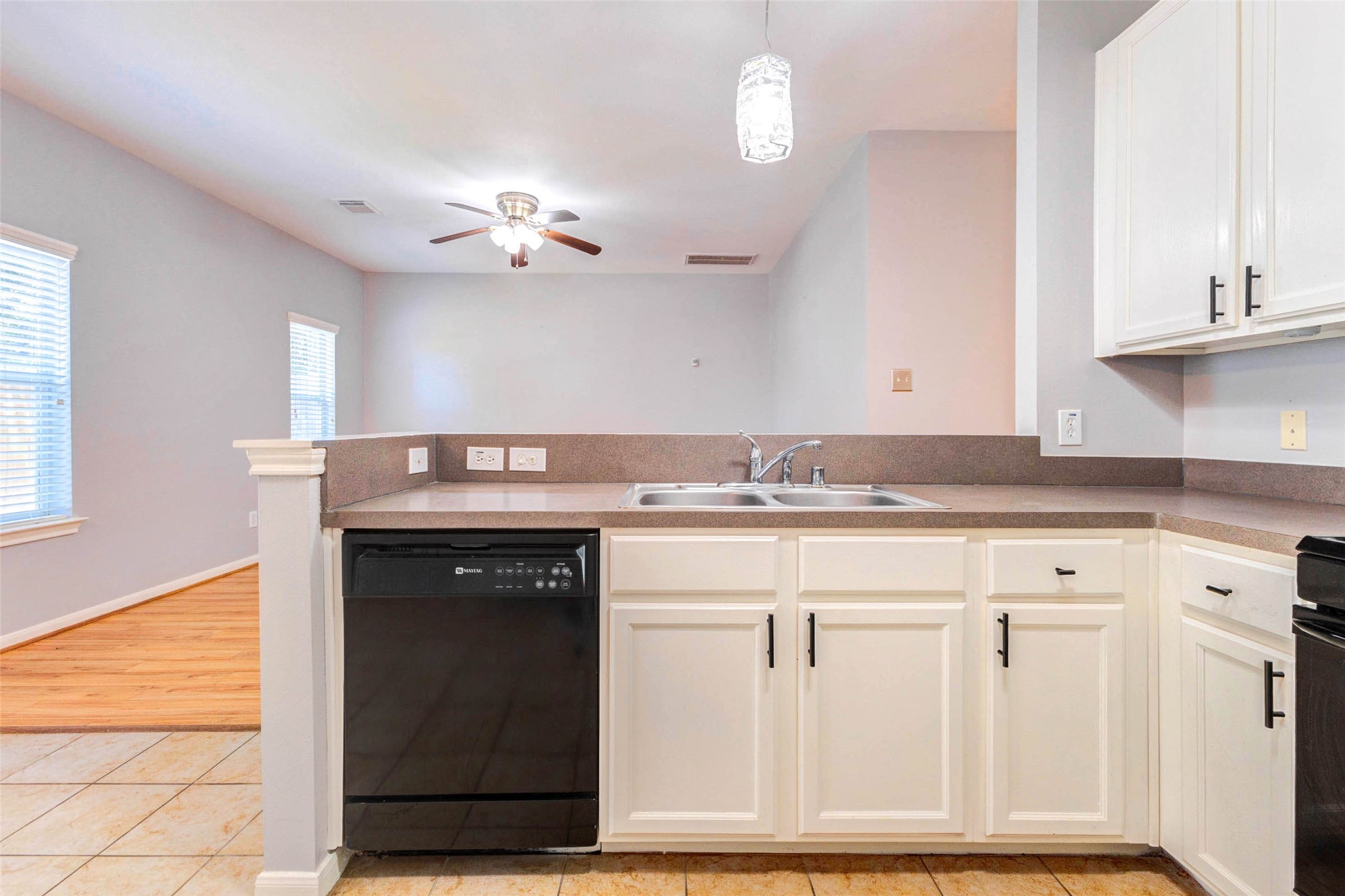 14522 Durham Chase Lane Houston, TX 77095 - Photo 14 of 40 a kitchen with granite countertop a sink cabinets and stainless steel appliances