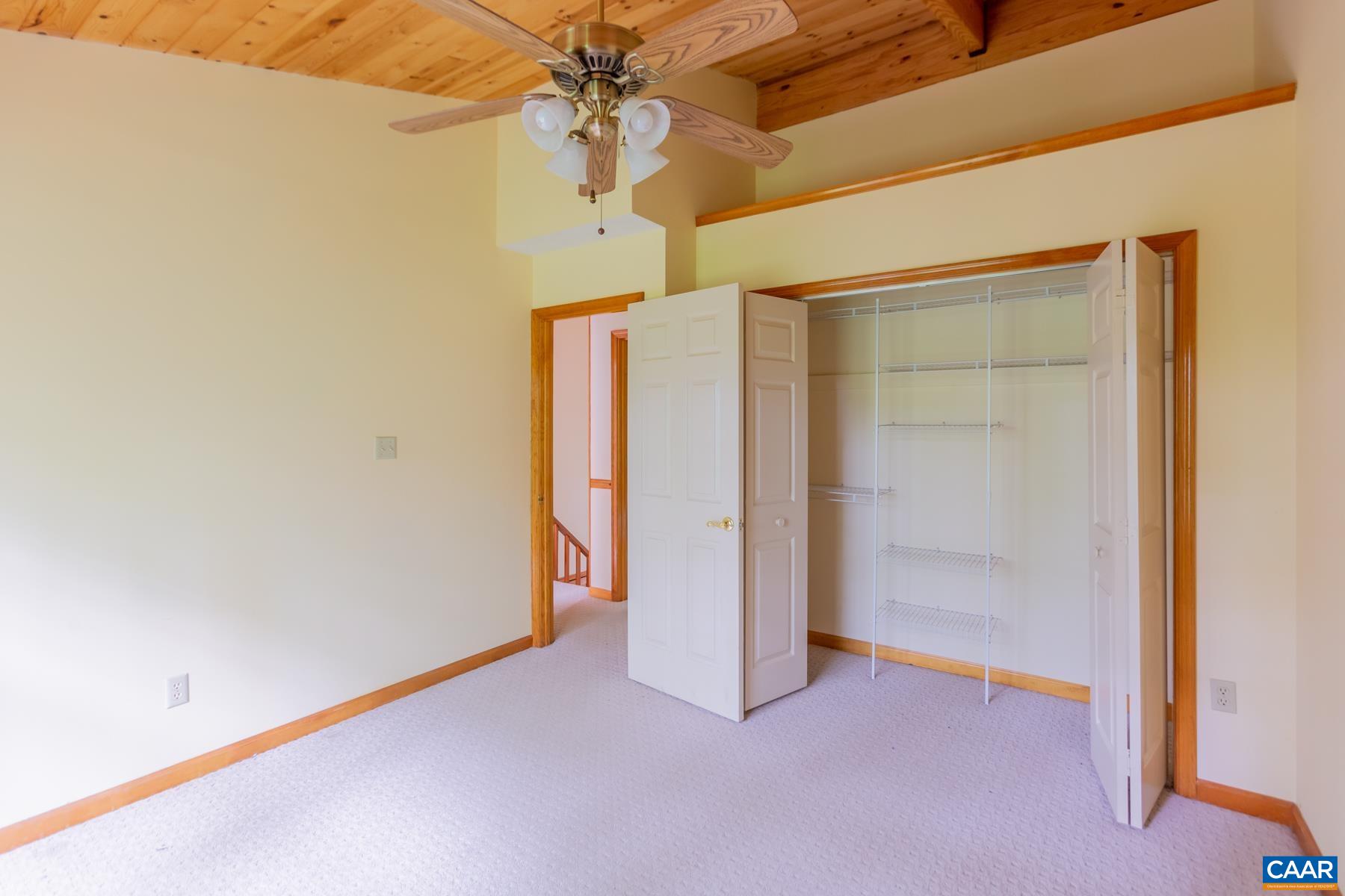 21 Briarwood Road Palmyra, VA 22963 - Photo 16 of 37 an empty room with a ceiling fan and closet