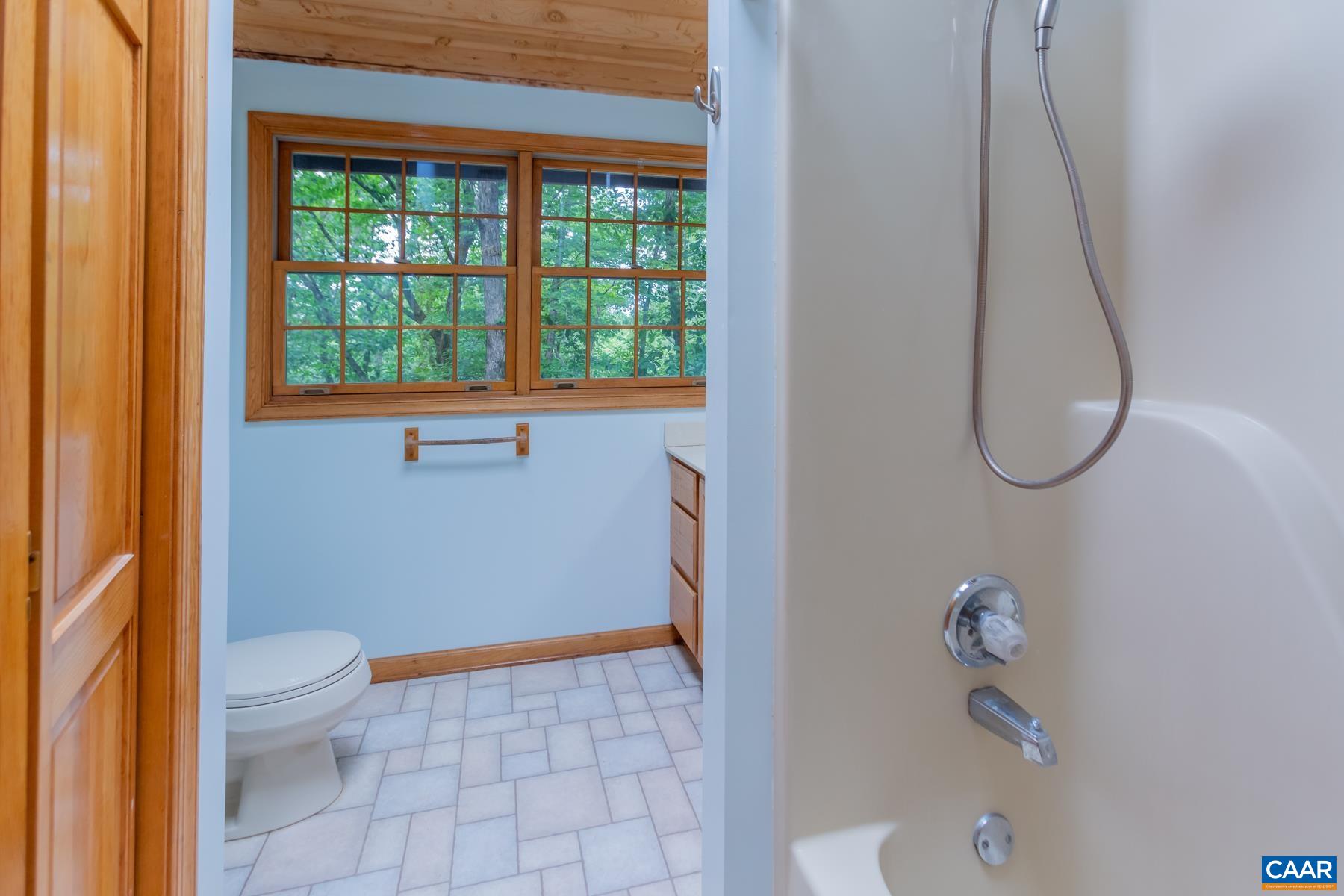 21 Briarwood Road Palmyra, VA 22963 - Photo 21 of 37 a bathroom with a toilet and a shower