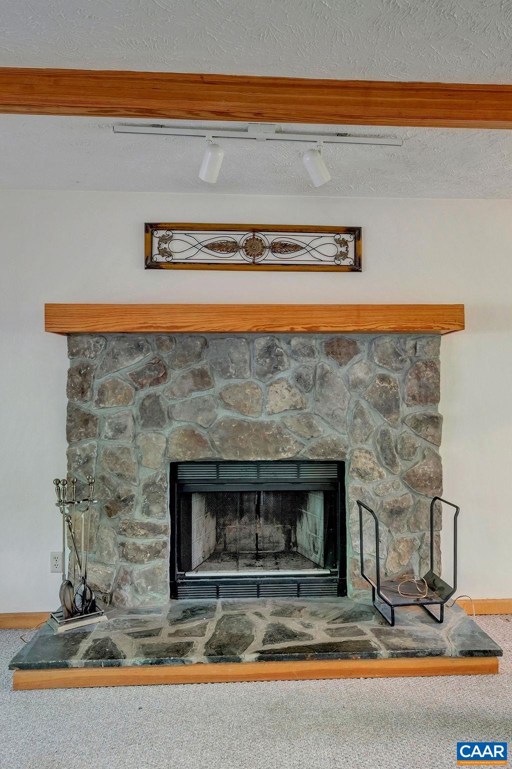 21 Briarwood Road Palmyra, VA 22963 - Photo 5 of 37 a living room with fireplace furniture and a fireplace