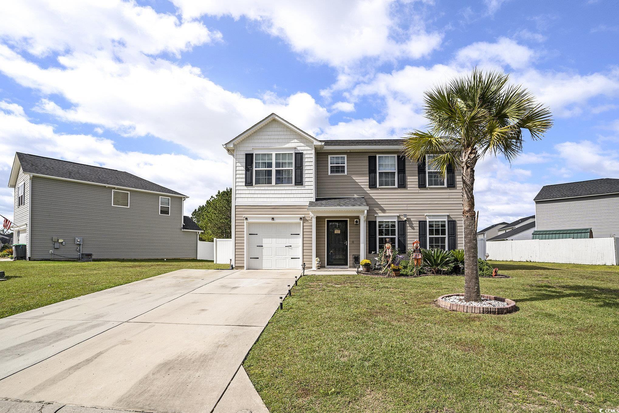 763 Trap Shooter Circle Longs, SC 29568 - Photo 1 of 37 Traditional-style house with driveway and a garage