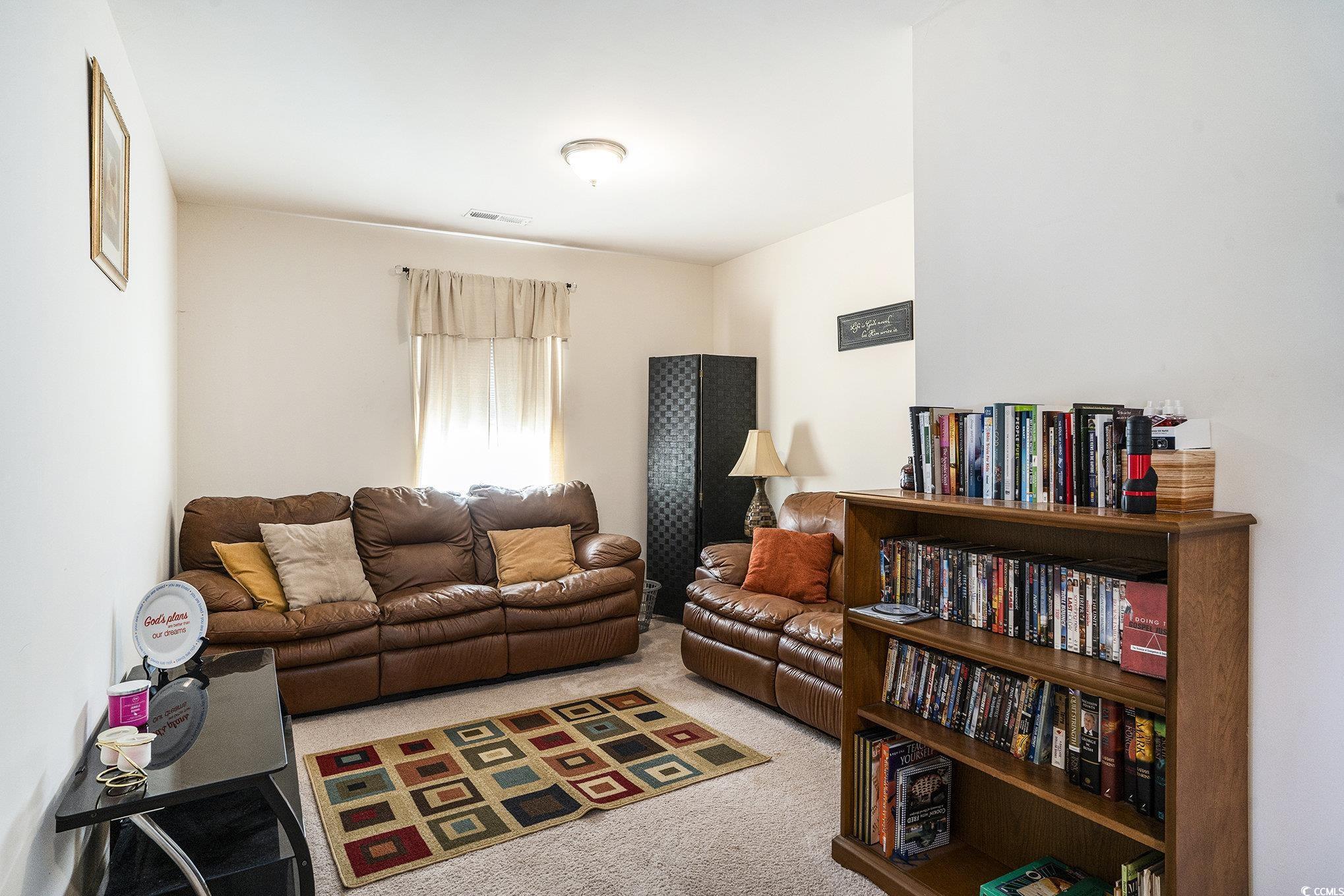 763 Trap Shooter Circle Longs, SC 29568 - Photo 15 of 37 Living room with carpet floors