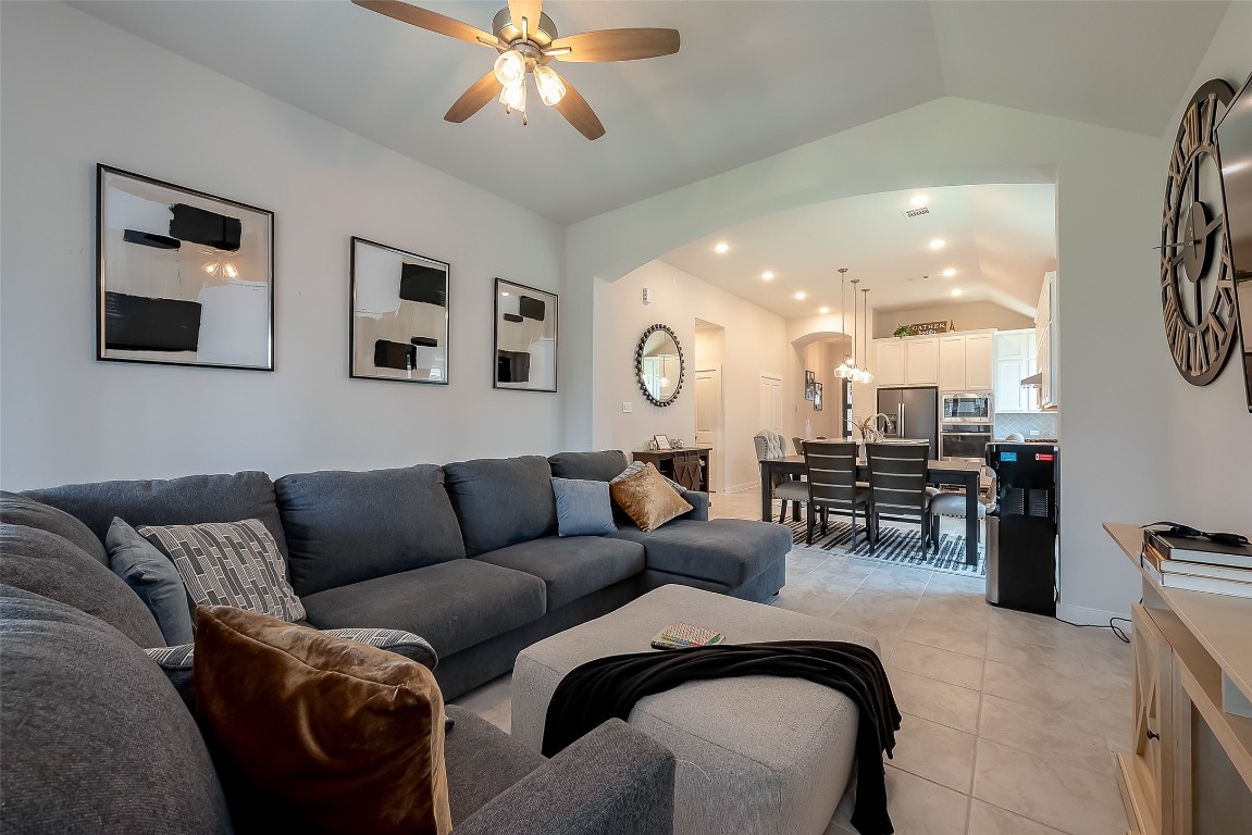 15714 Autumn Sun Conroe, TX 77302 - Photo 25 of 31 a living room with furniture and a large window