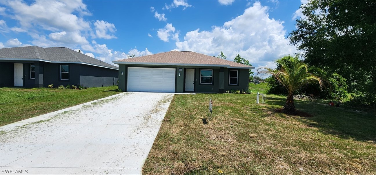 30036 Red Pine Road Punta Gorda, FL 33982 - Photo 4 of 12 a view of a house with a yard