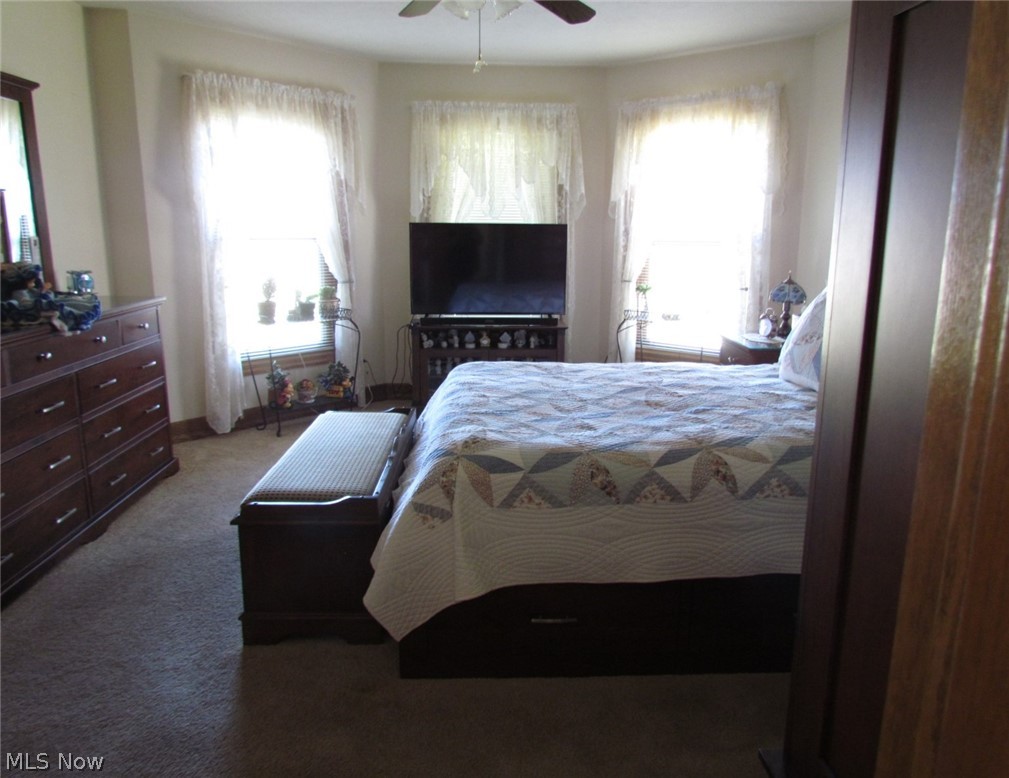 10174 Veto Road Belpre, OH 45714 - Photo 25 of 45 Primary bedroom on main floor with abundant light.