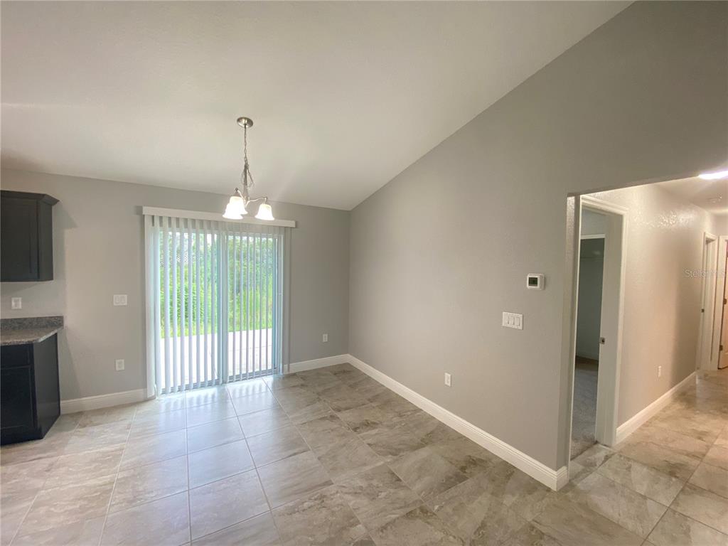3200 Southwest 129th Loop Ocala, FL 34473 - Photo 12 of 29 a view of an empty room with a window