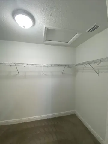 a view of a room with racks on the wall