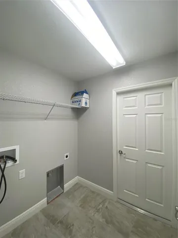 an empty room with a empty space and empty shelves