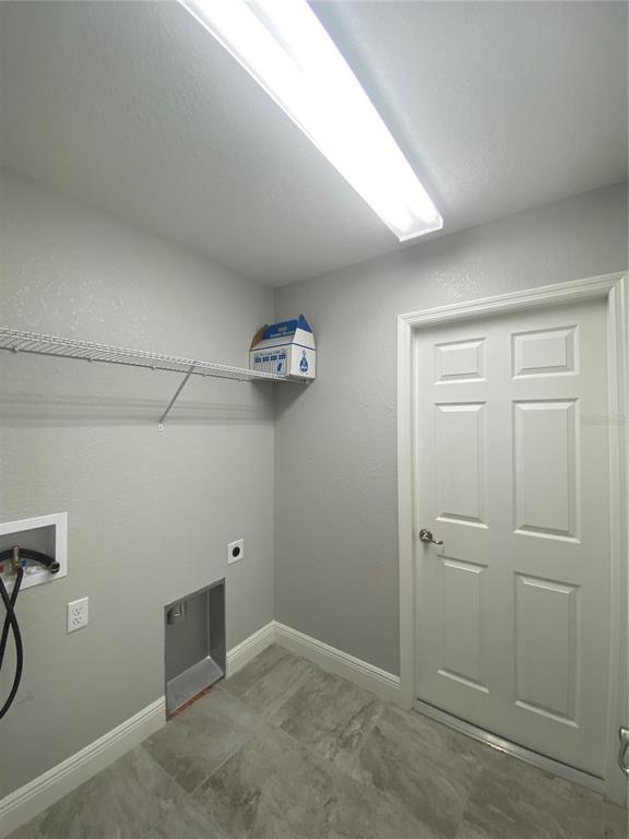 3200 Southwest 129th Loop Ocala, FL 34473 - Photo 25 of 29 a view of room with racks on the wall
